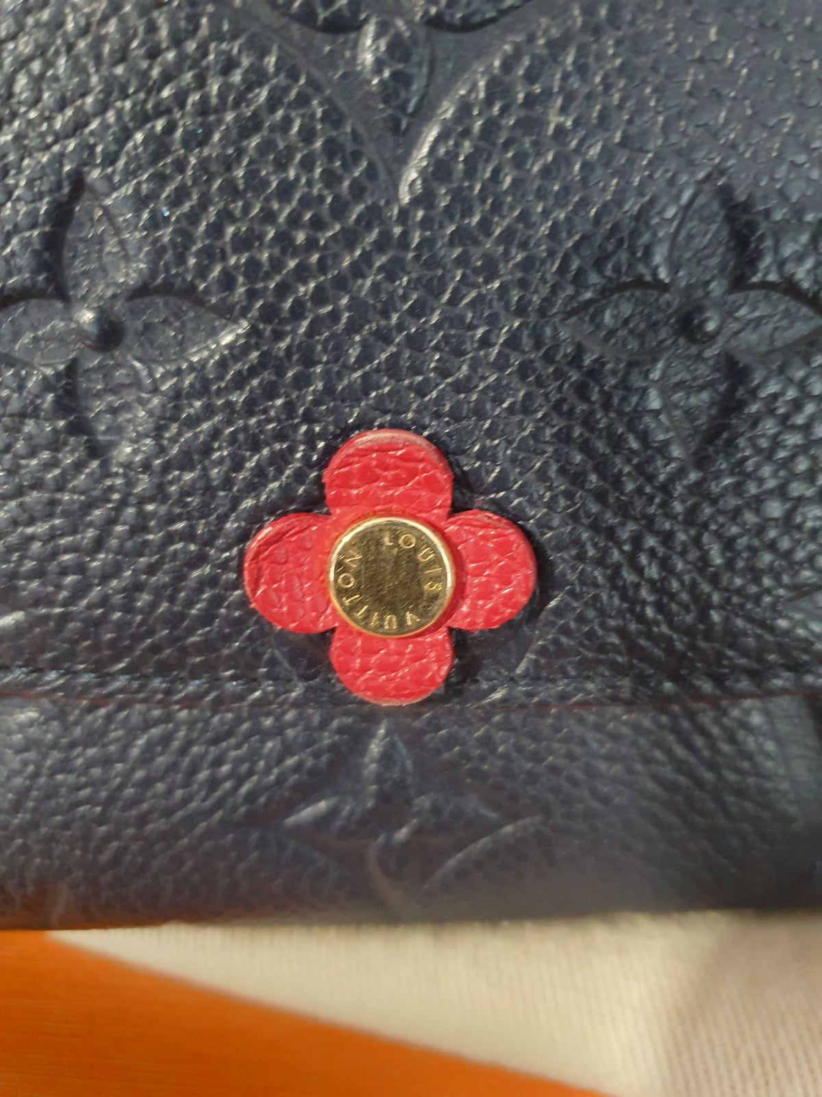 Original Louis Vuitton Geldbörse Emilie Flower Empreinte Leder Marine Rouge