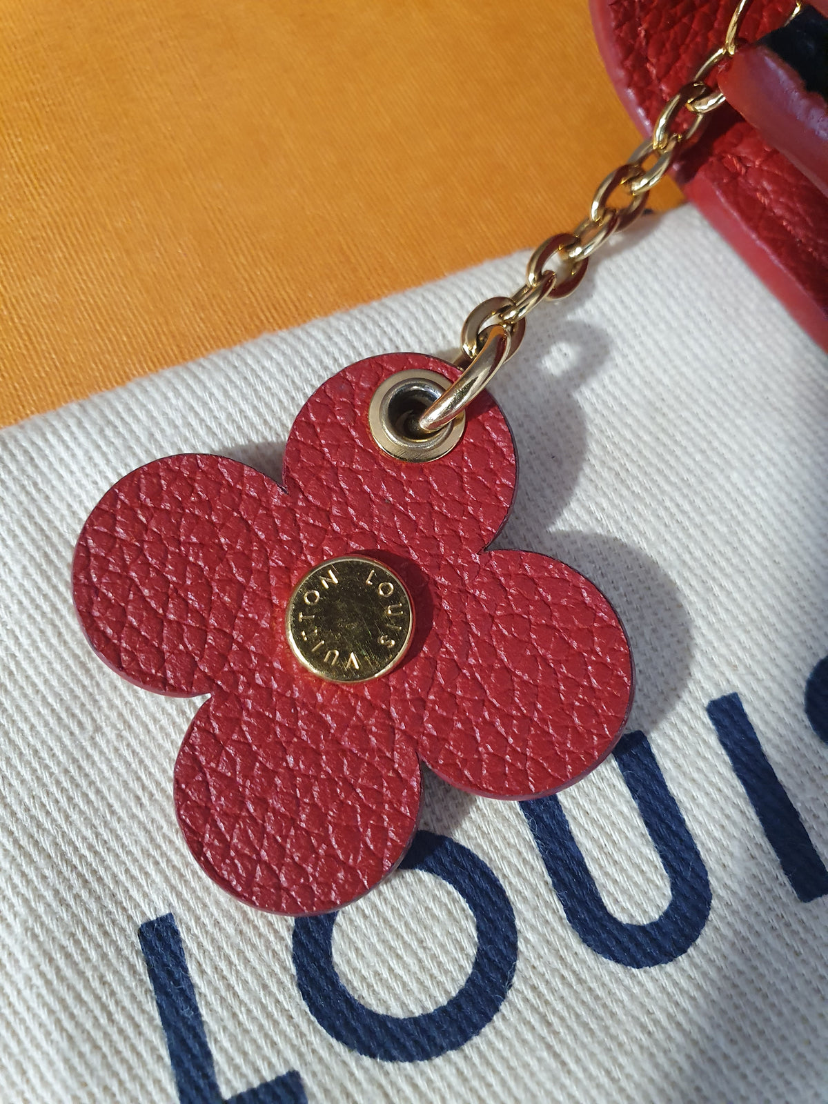 Original Louis Vuitton Geldbörse Emilie Flower Empreinte Leder Marine Rouge