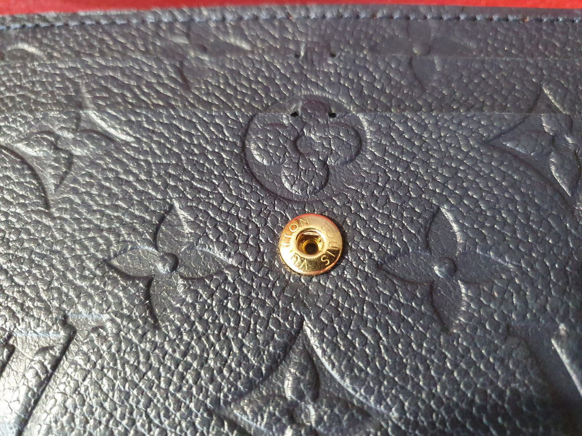 Original Louis Vuitton Geldbörse Emilie Flower Empreinte Leder Marine Rouge